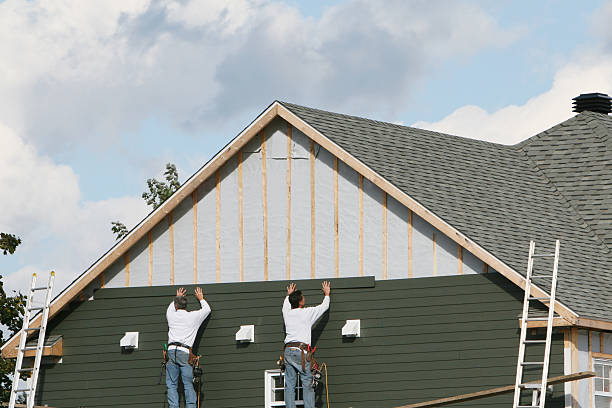 Professional Siding Installation technician working in Lawrenceville, VA